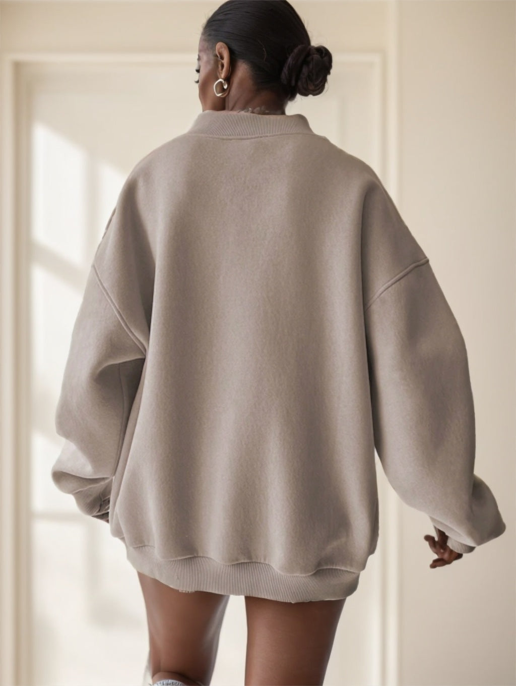 Apricot drop-shoulder sweatshirt fabric detail showing soft knit