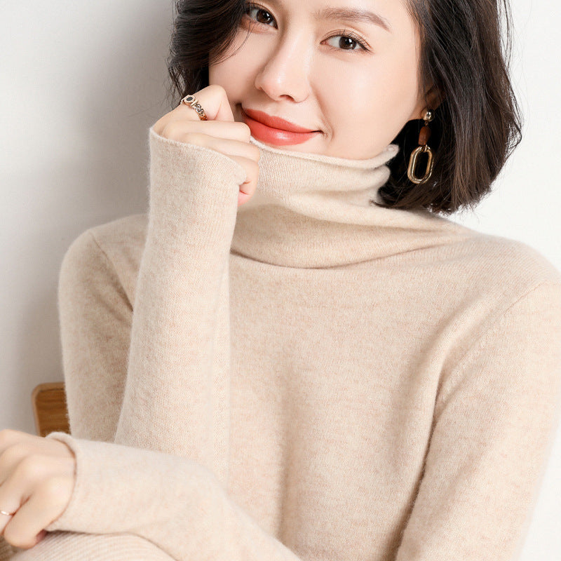 Cherry blossom pink cashmere turtleneck sweater on model