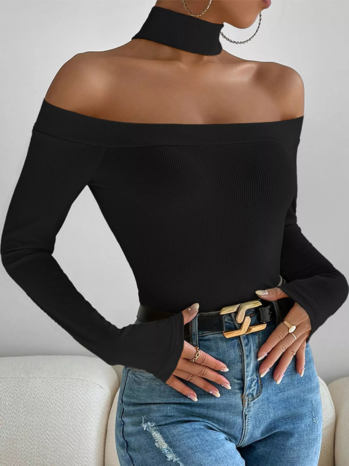 Venus Off-Shoulder Choker Knit Top in black — styled flat lay