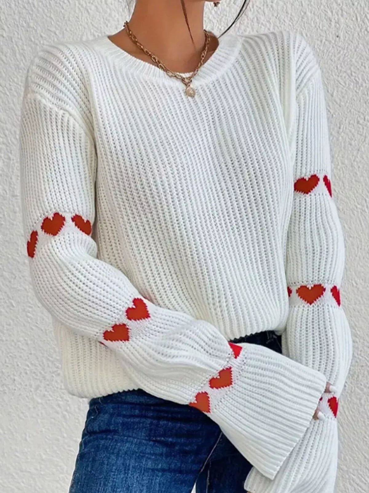 Amour Muse heart drop-shoulder sweater in white with red hearts