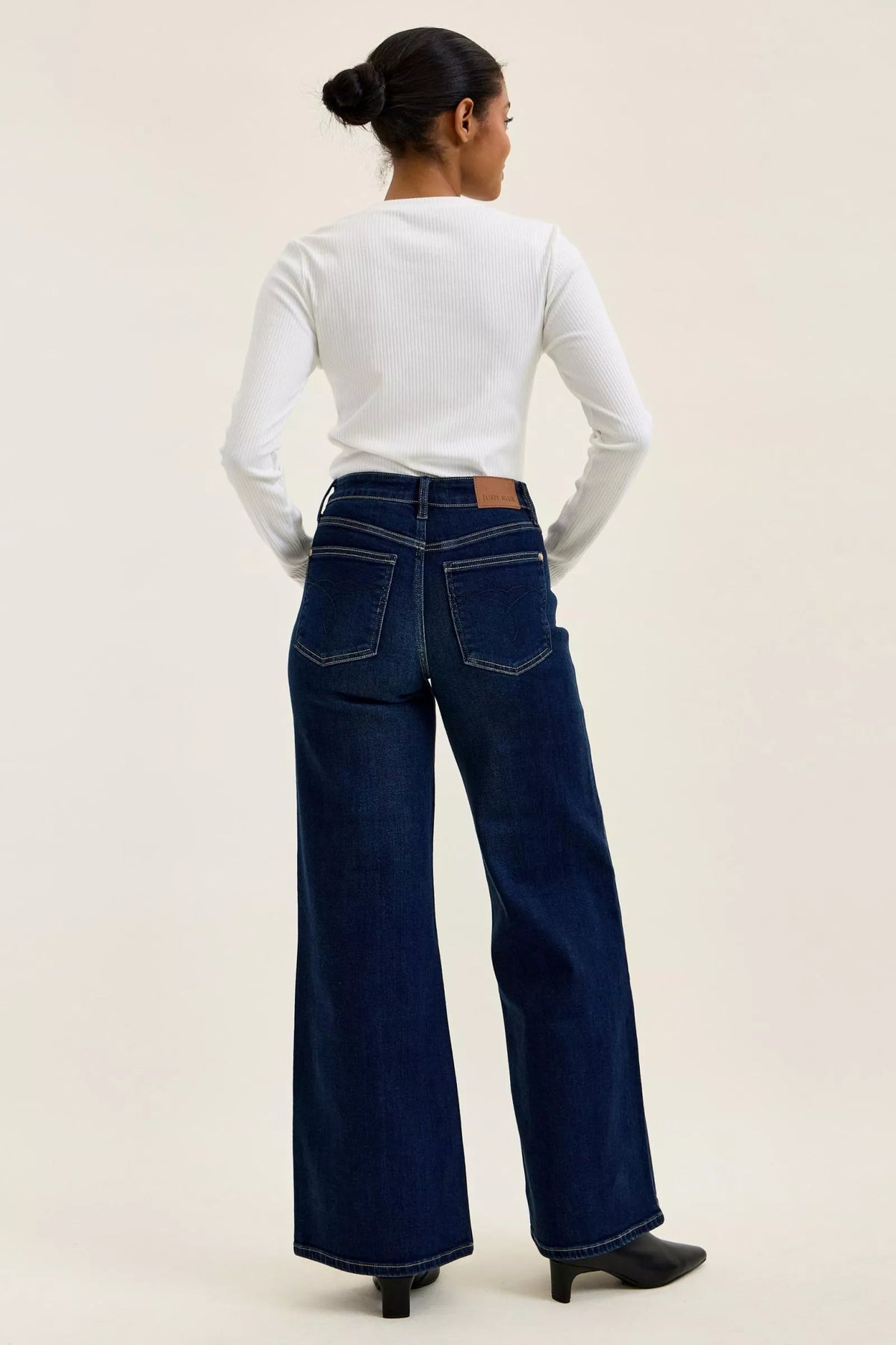 Judy Blue Dark-Wash Wide-Leg Jeans in dark wash denim — lifestyle shot