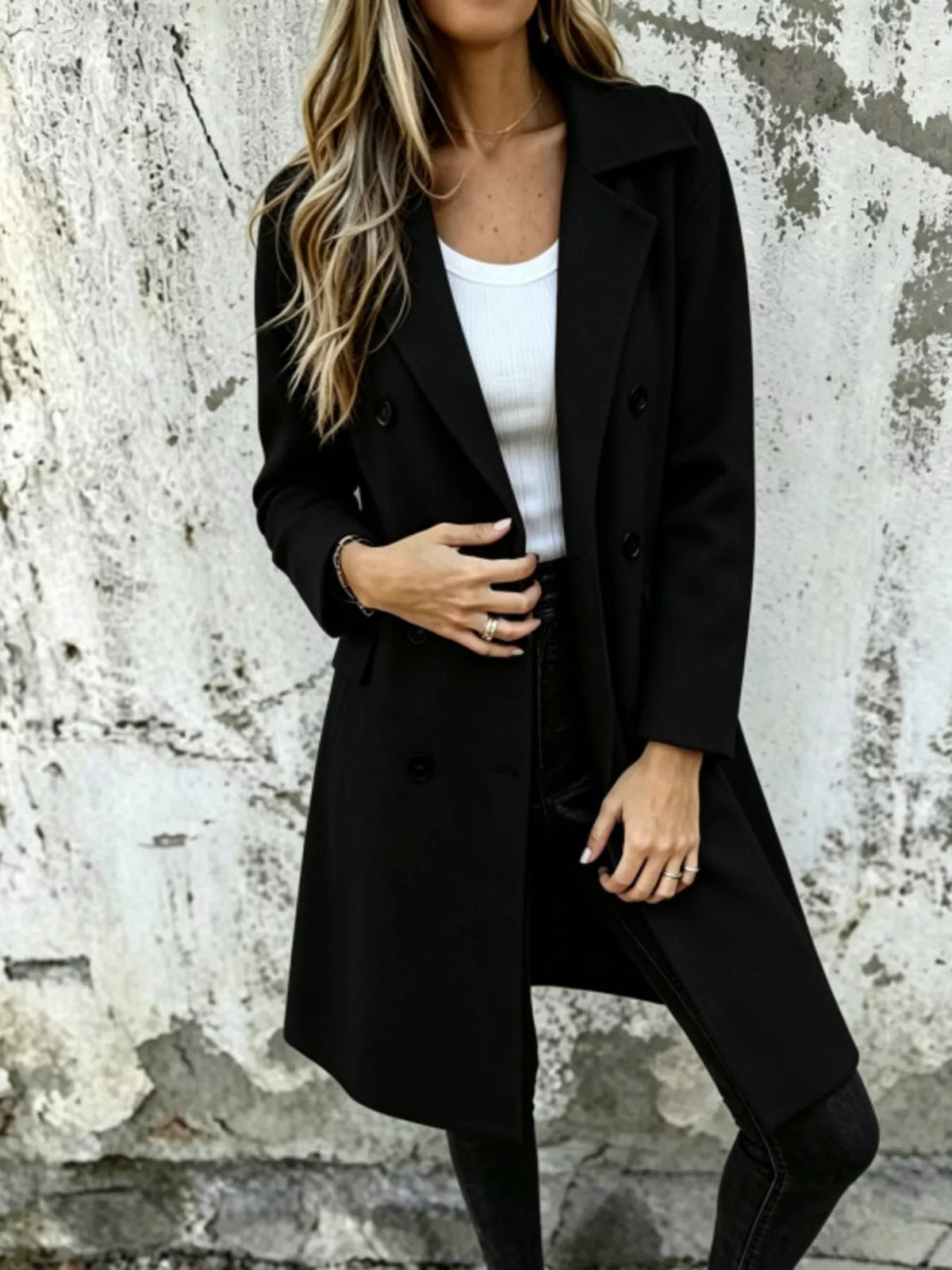 Khaki double-breasted lapel coat styled over casual layers