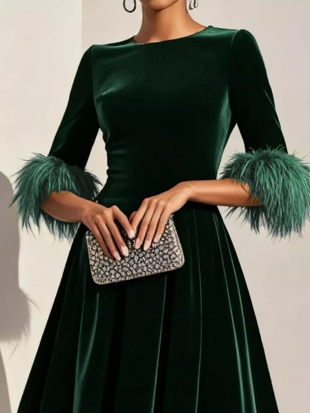 Velvet feather cuff midi dress side view showing fit and flare silhouette