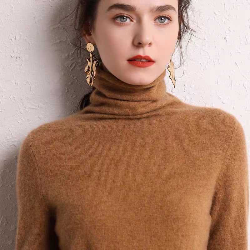 Cinnabar red cashmere turtleneck, close-up knit detail