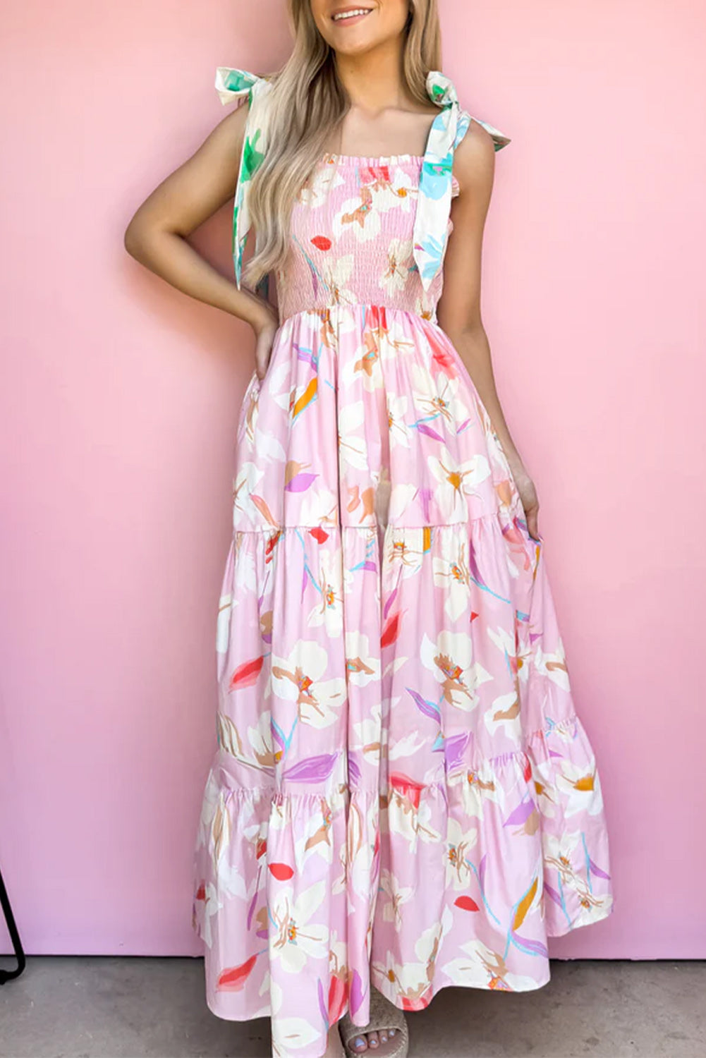 Pink floral sleeveless tiered maxi dress with a flowy silhouette, perfect for spring, summer, vacations, and casual occasions.