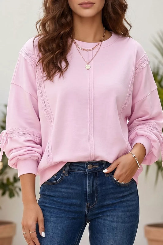 Birch Raw-Seam Lace Detail Sweatshirt in blush pink — front view on model