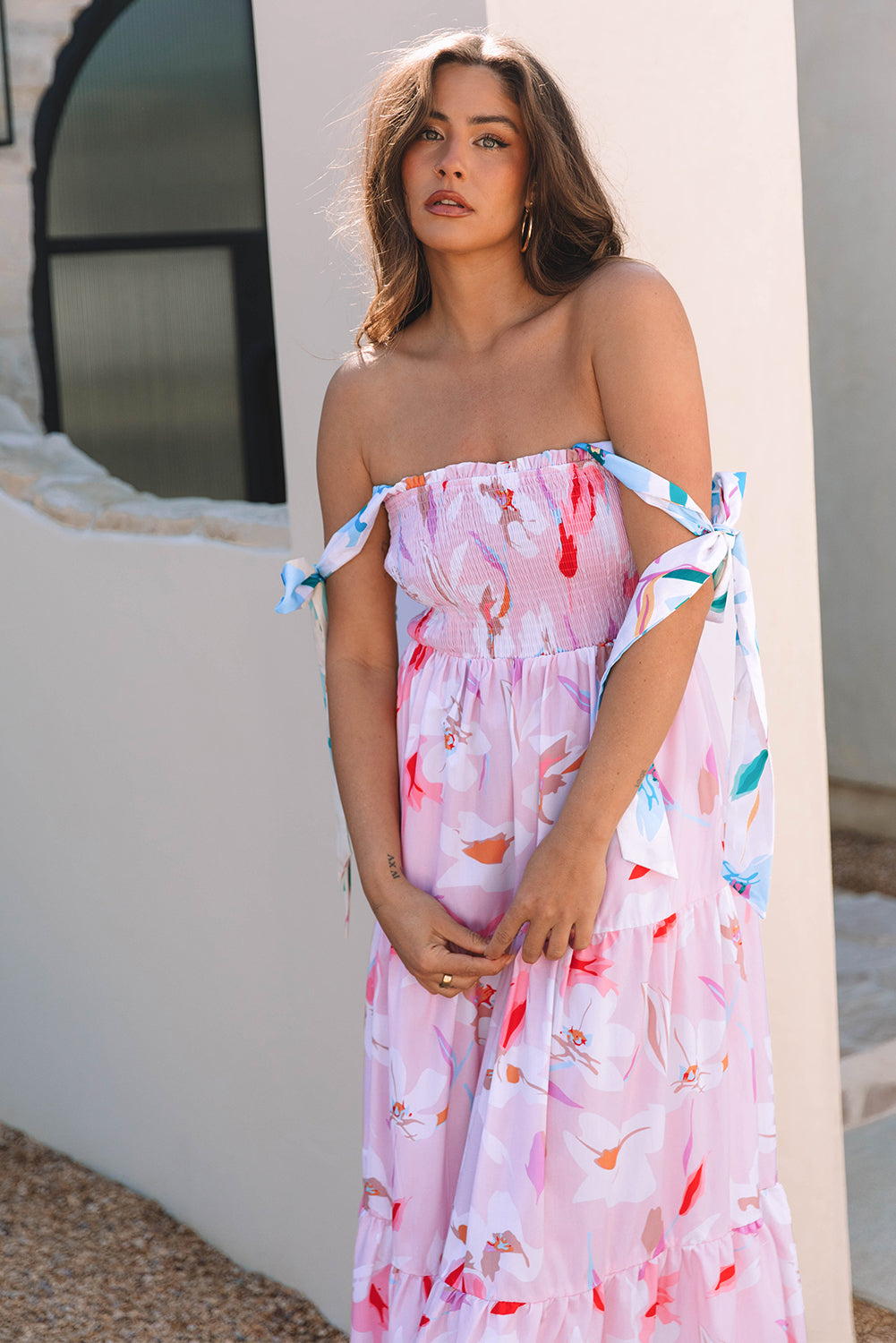 Close-up of the pink floral sleeveless maxi dress, highlighting the floral print, neckline, and soft, lightweight fabric