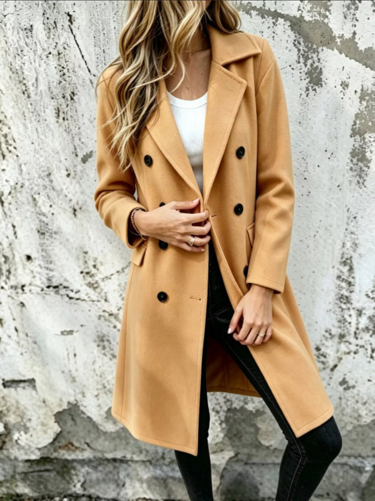 Woman wearing khaki Sovereign double-breasted lapel coat — knee-length tailored outerwear