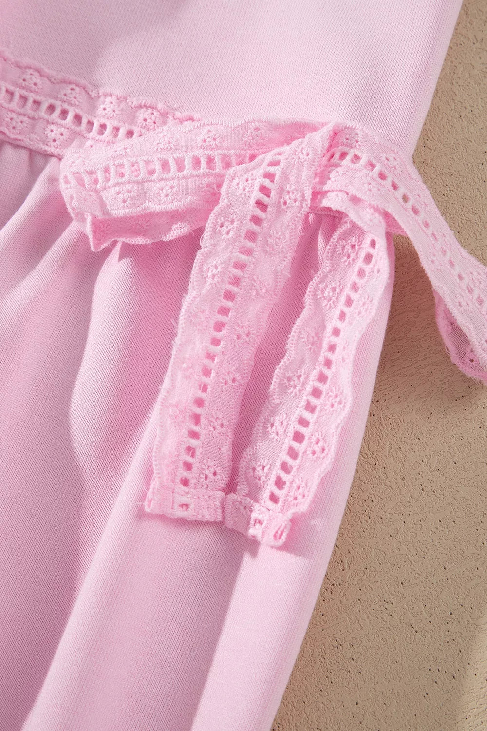 Birch Raw-Seam Lace Detail Sweatshirt in blush pink — close-up detail