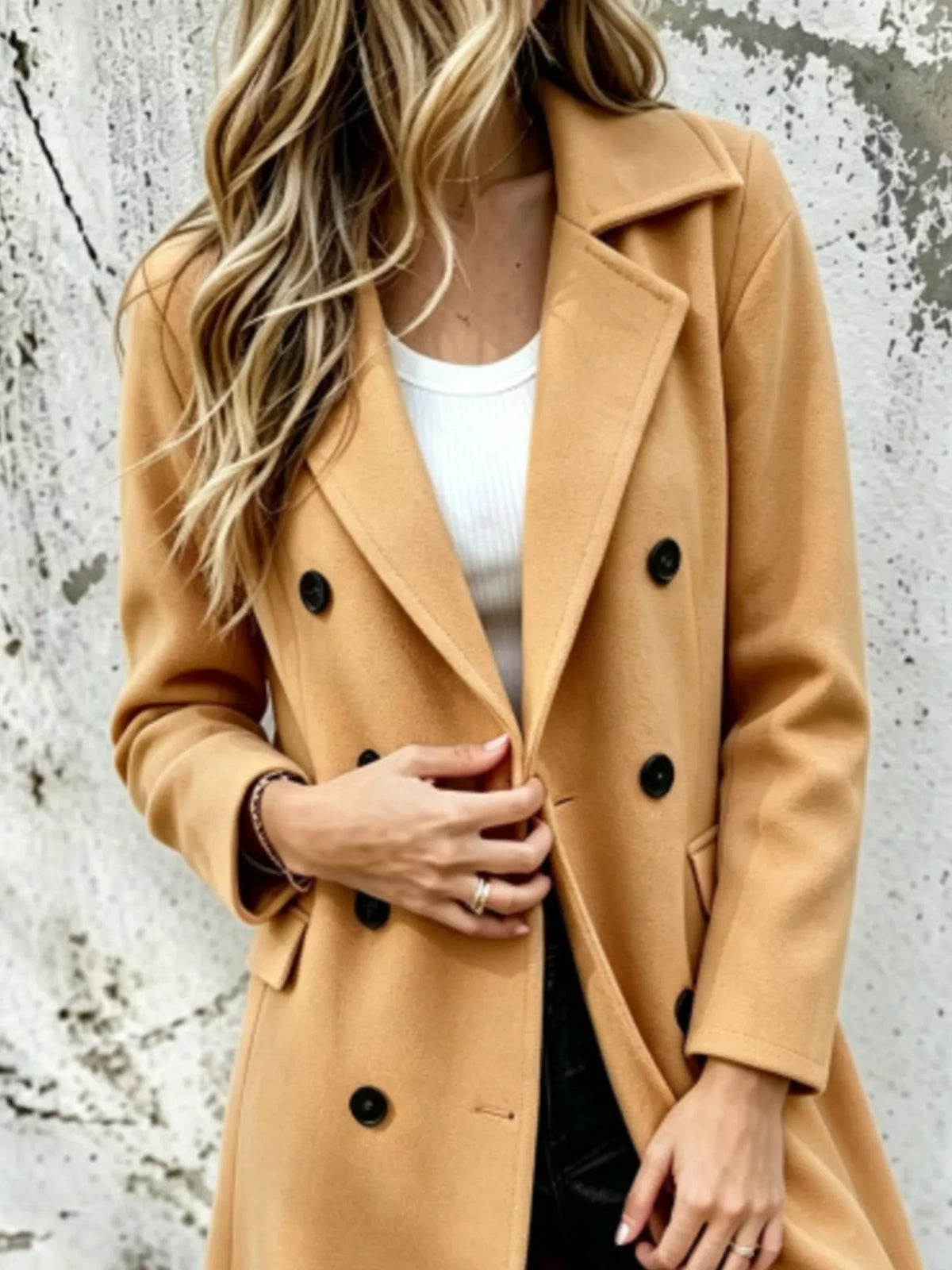 Sovereign double-breasted coat — notched lapel and button front detail
