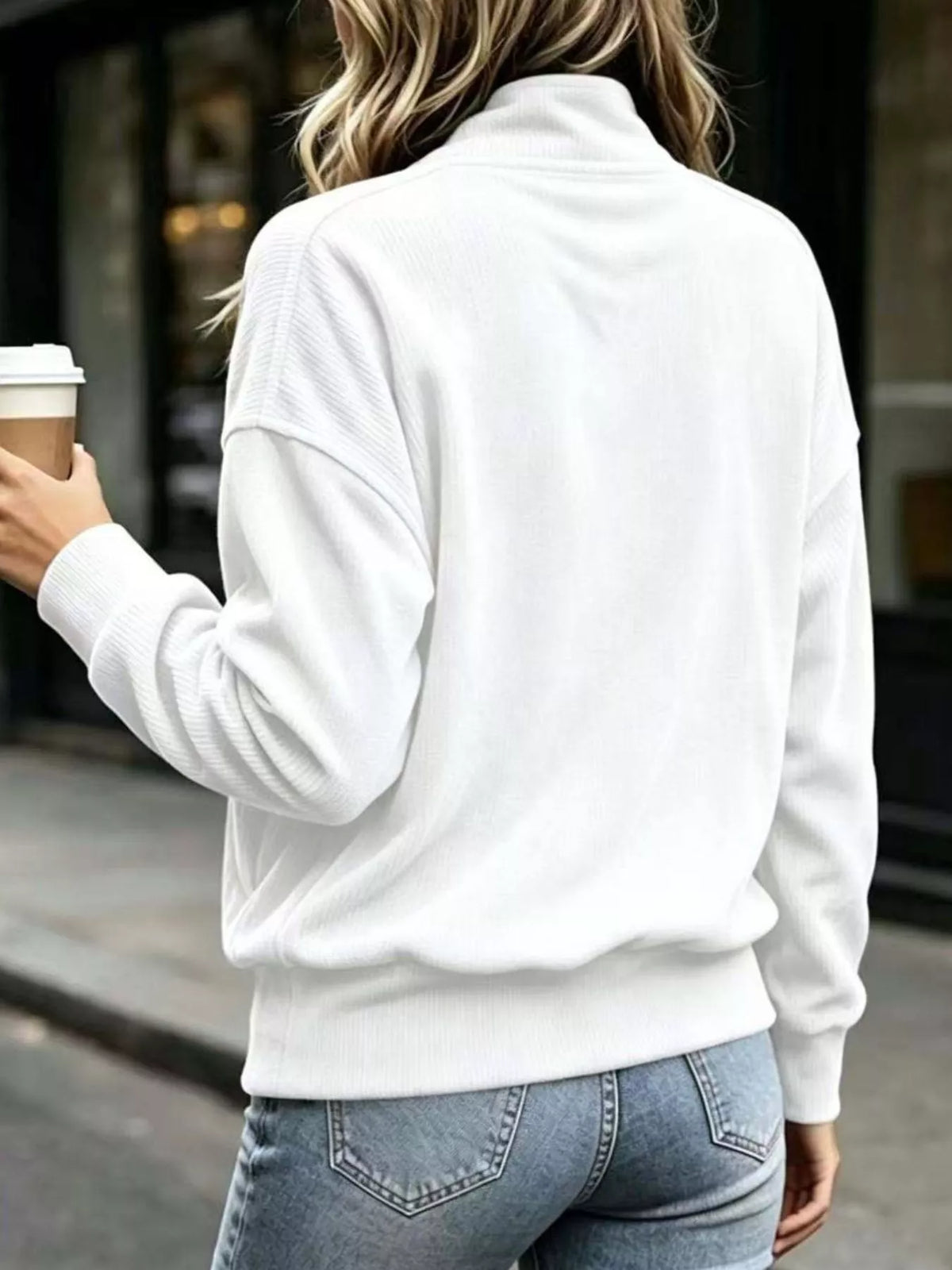 Lyric quarter-snap sweatshirt — button placket and kangaroo pocket detail