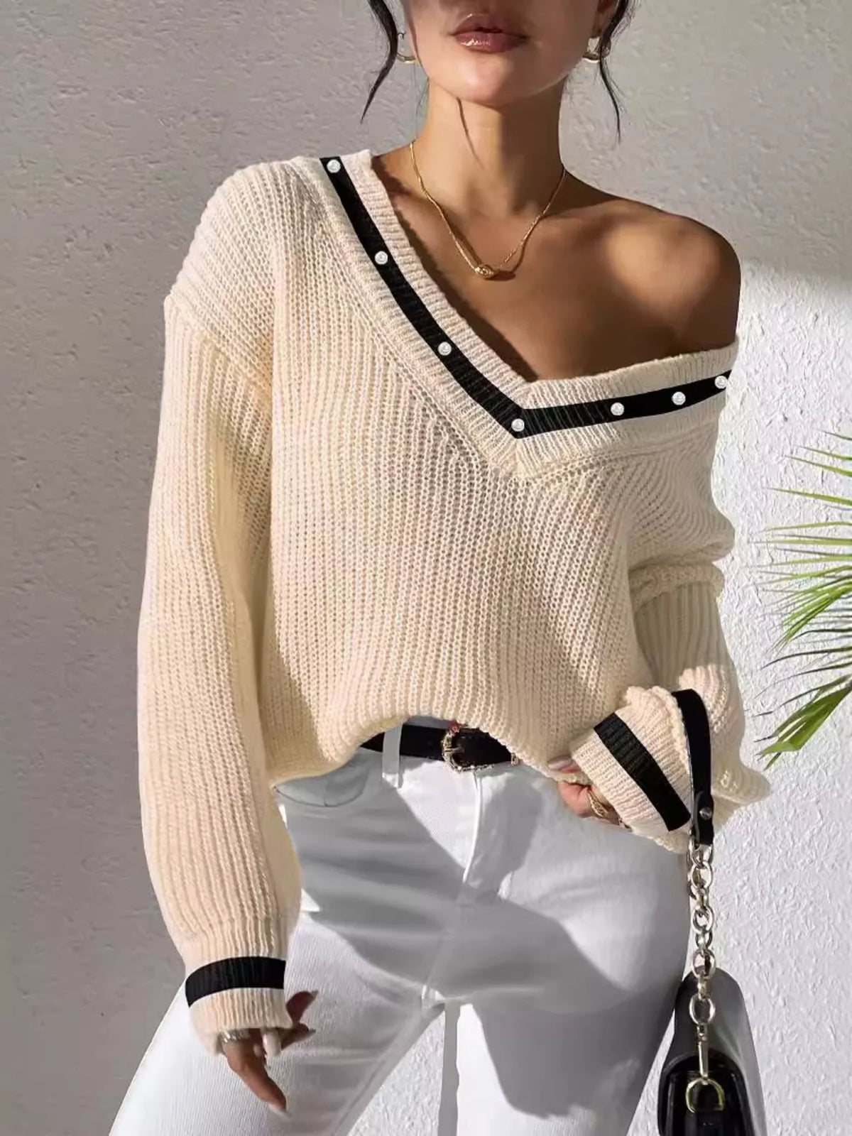 Parisian Muse pearl-trim v-neck sweater in cream, worn off-shoulder